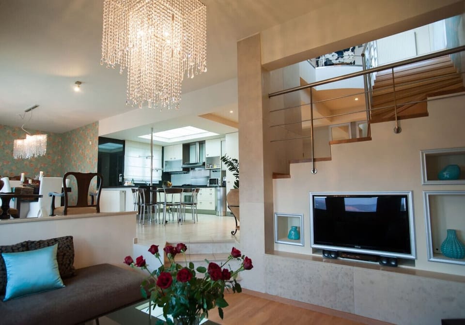 Bright open-plan living and kitchen, ideal for cooking and relaxing together.