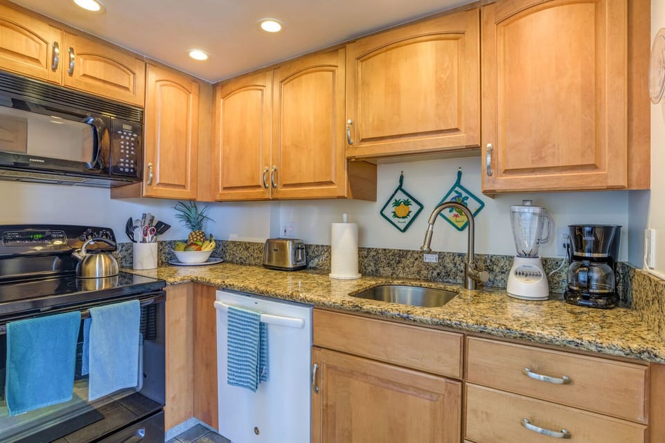 Nicely updated kitchen, well supplied for your convenience
