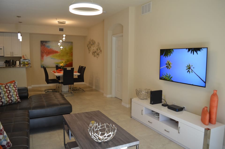 Luxury Condo, Multiple Beds, Non Smoking, Garden View | Living area | Smart TV