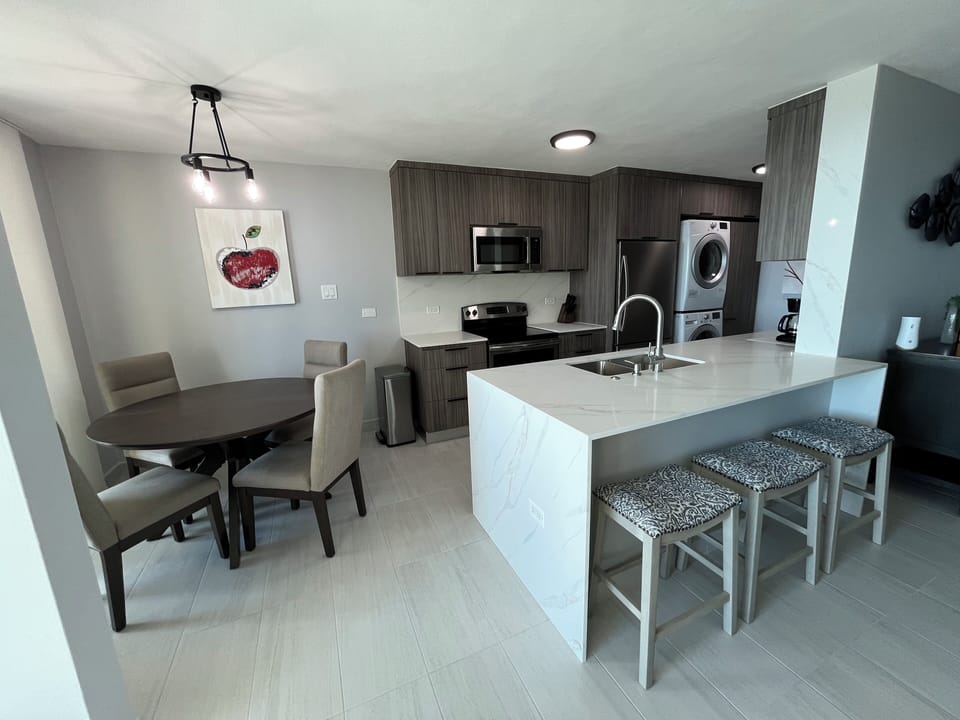 Wow! Newly Remodeled Kitchen w. Quartz counters & New Dining and seating areas!