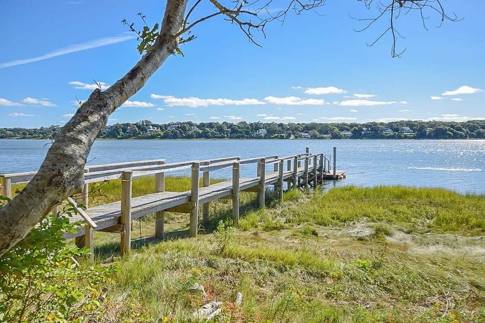 dock stretching into the cove