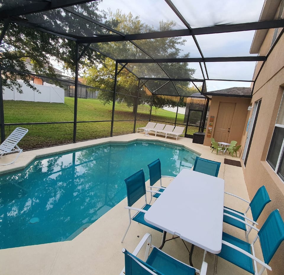 large swimming pool with optional security fence (Toilet in the corner with AC) 