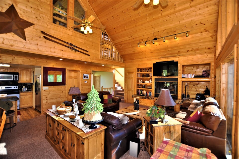 55 inch smart TV above fireplace that pulls down for adjustable viewing 