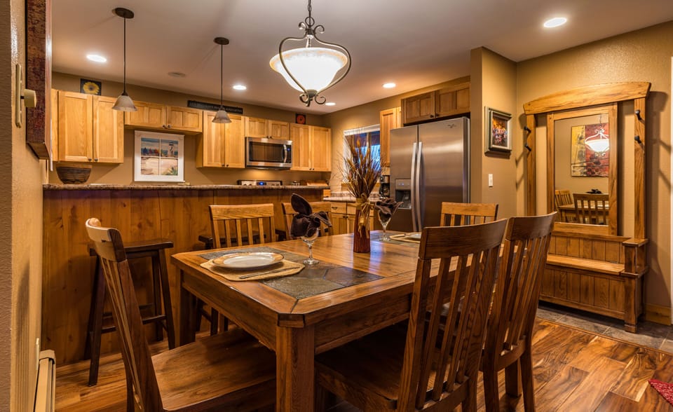 Newly remodeled kitchen and dining room with stainless steel appliances.