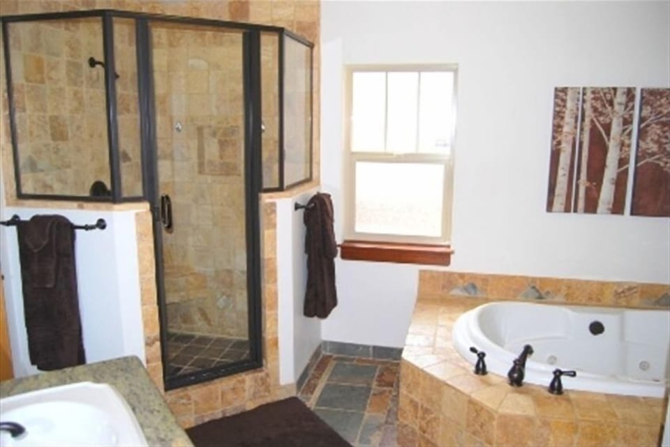 Master Bath has dual sinks, large tub, private powder room and granite counters.
