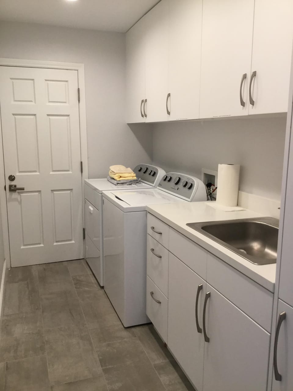 Lower level laundry room. 