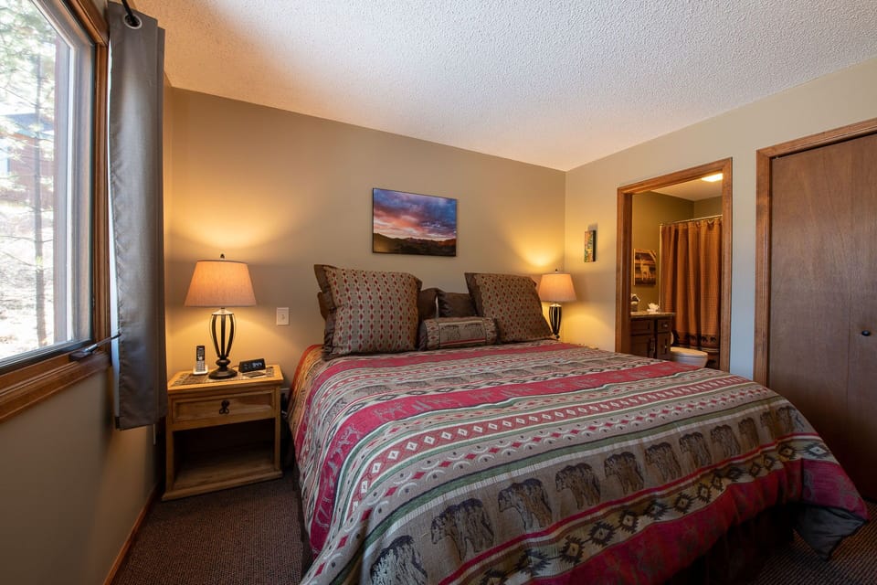 Master main level bedroom with adjoining bathroom