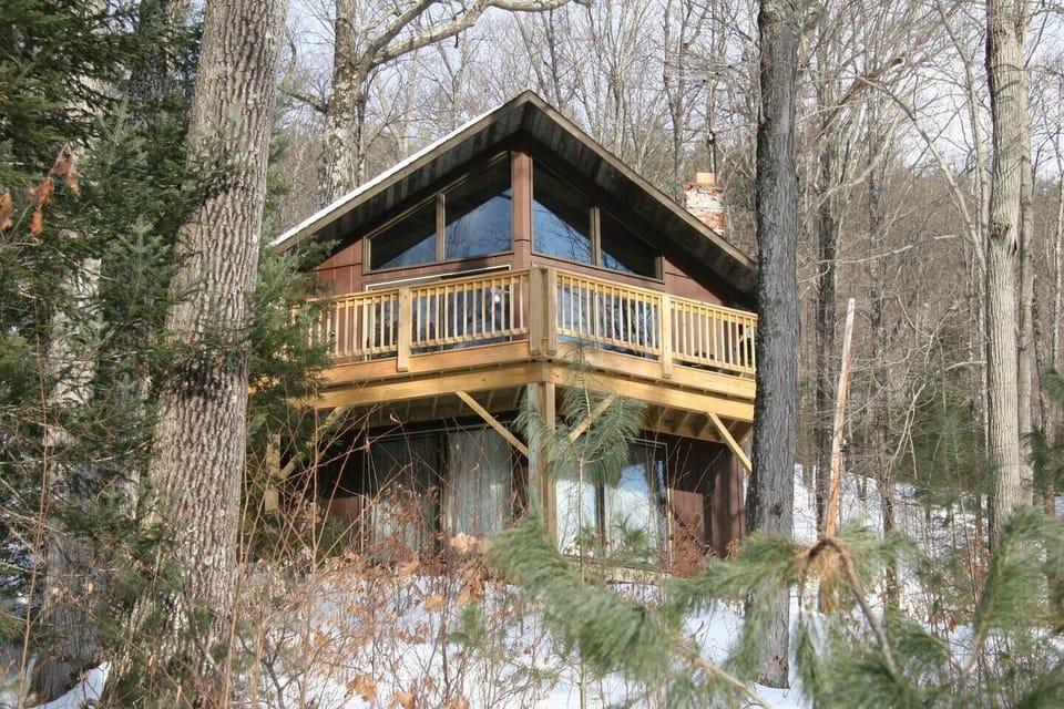 View from bottom of driveway in the winter of our A-Frame chalet
