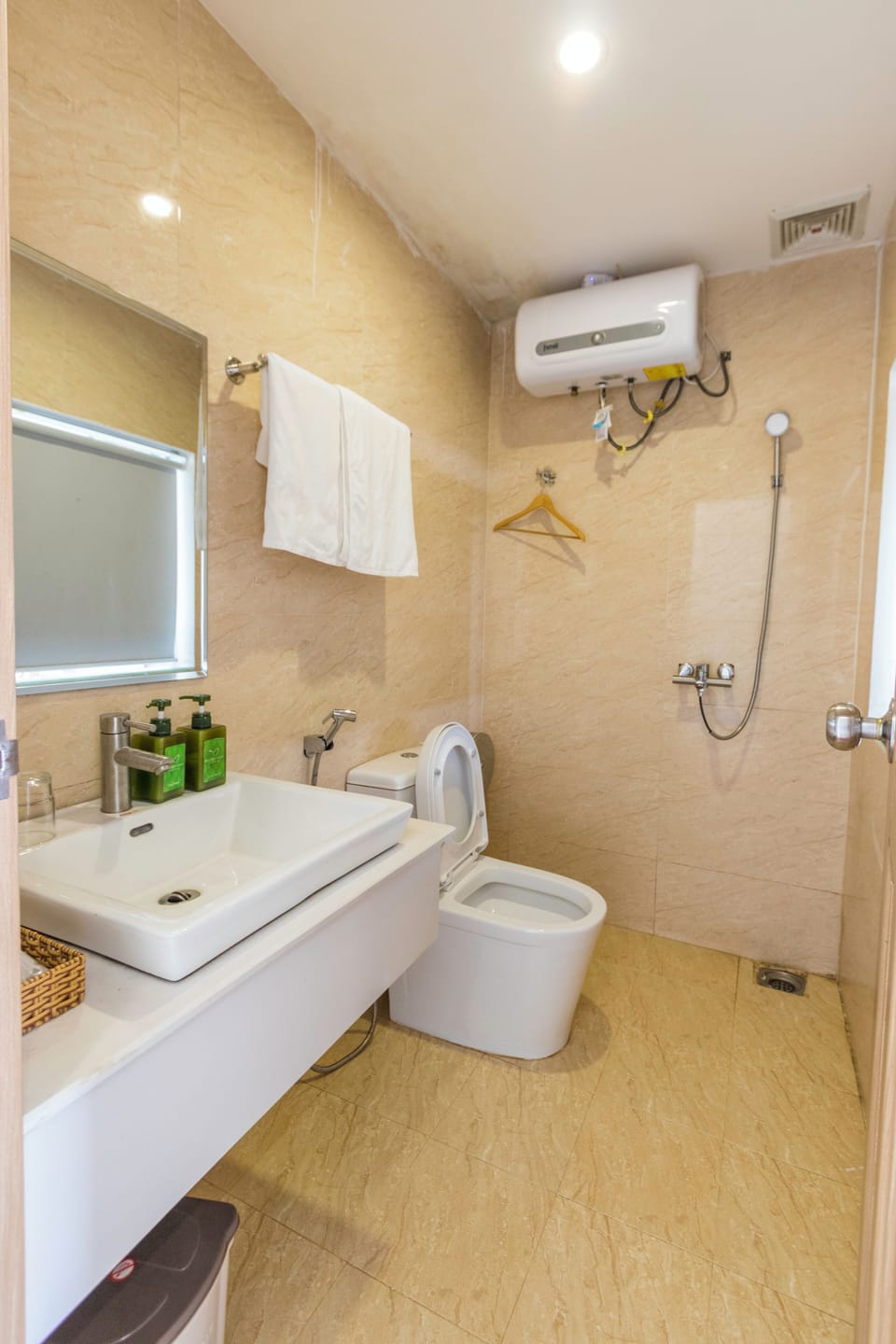 Shower, free toiletries, hair dryer, slippers