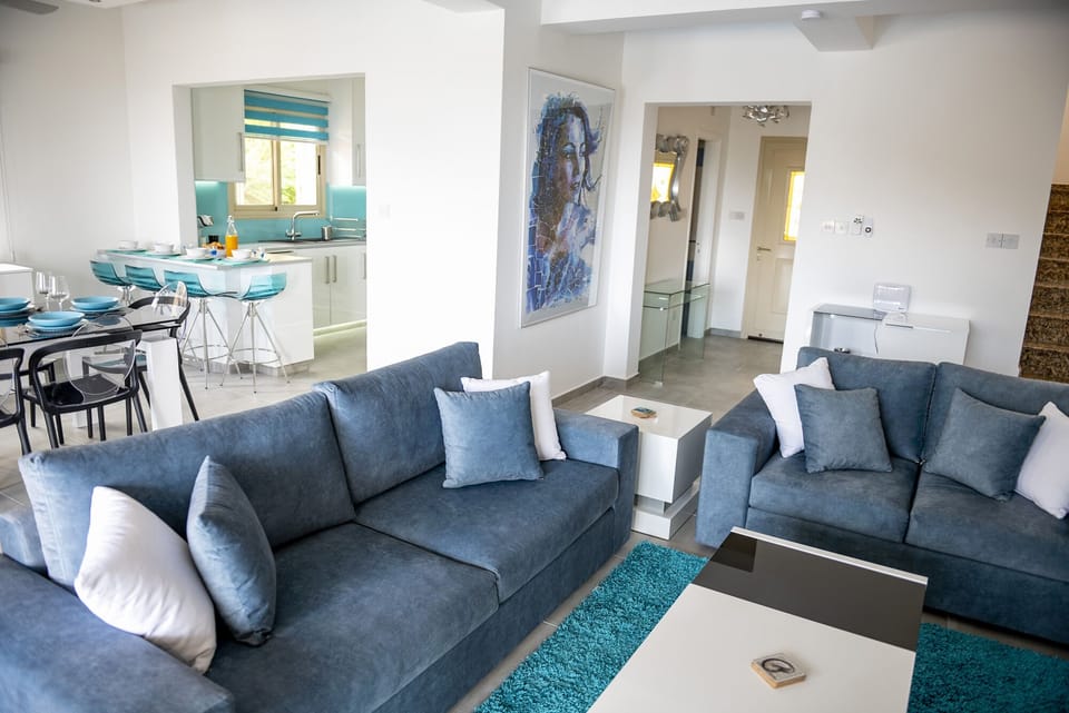 Lounge area with kitchen beyond