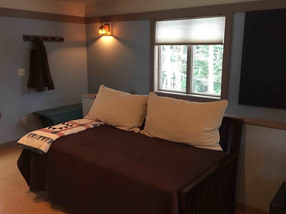 This daybed is a great place to settle in with a book or watch TV.
