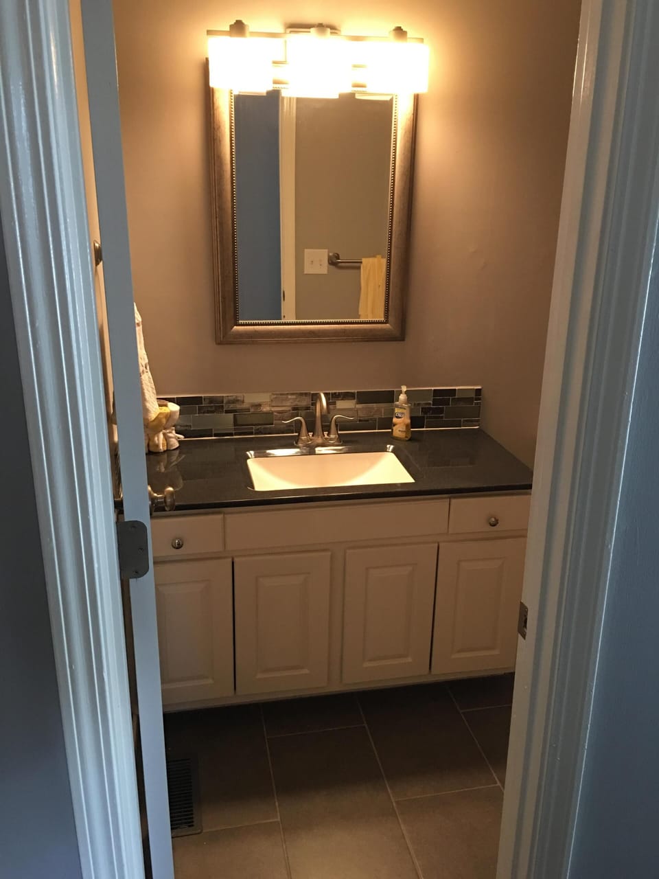 New hall bathroom vanity: tile shower & floors, counter tops & back splash.
