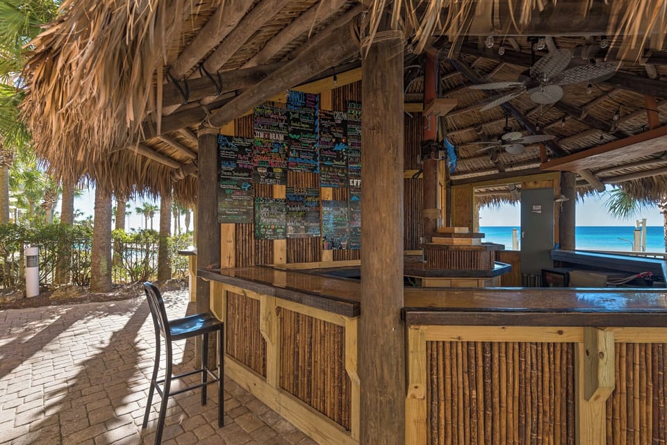 Enjoy a cold drink and snack at the Tiki Bar!