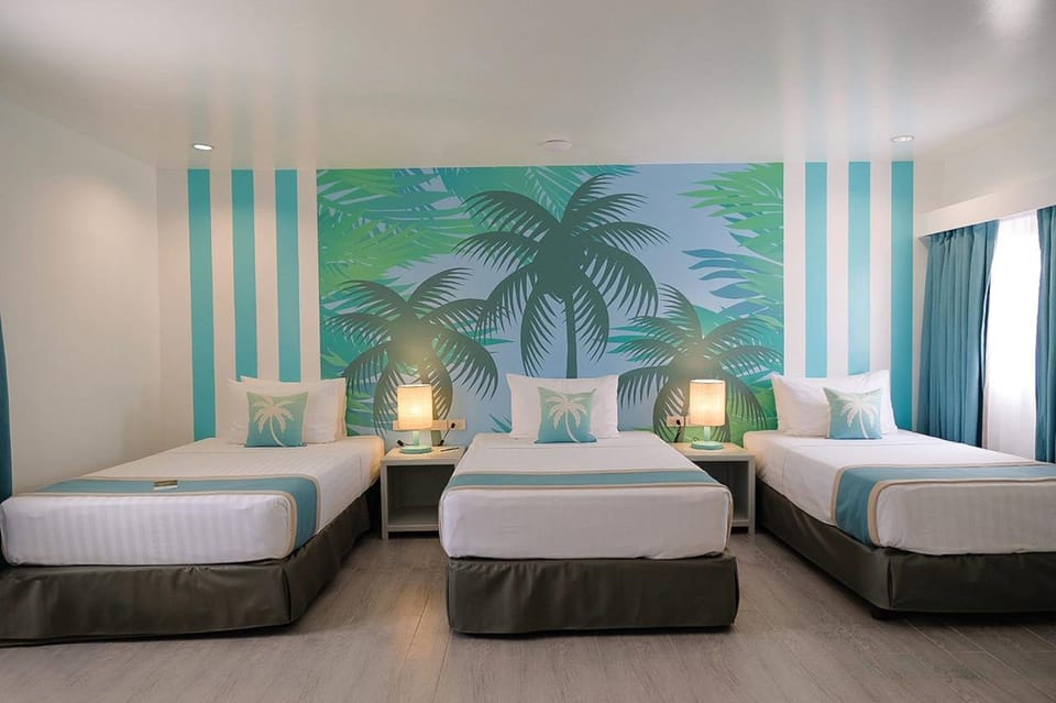 Family Room | In-room safe, desk, blackout drapes, rollaway beds