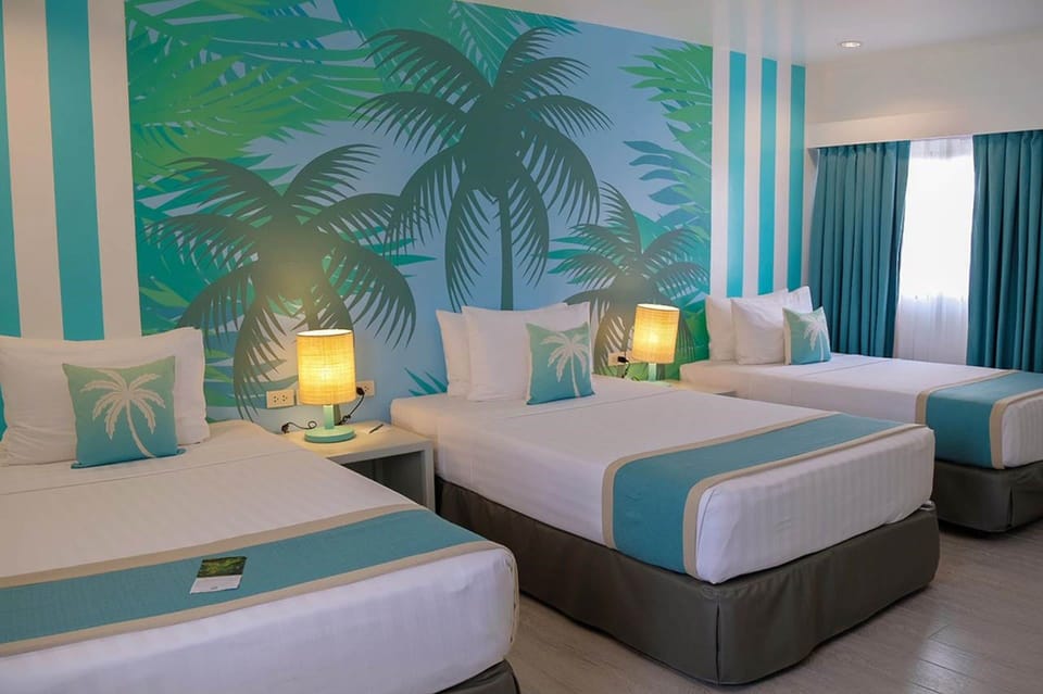 Family Room | In-room safe, desk, blackout drapes, rollaway beds