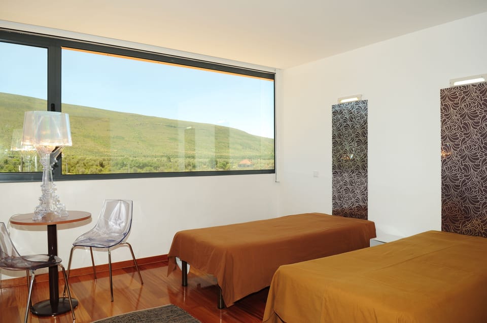 Twin Room, Private Bathroom | Blackout drapes, WiFi (free), bed sheets