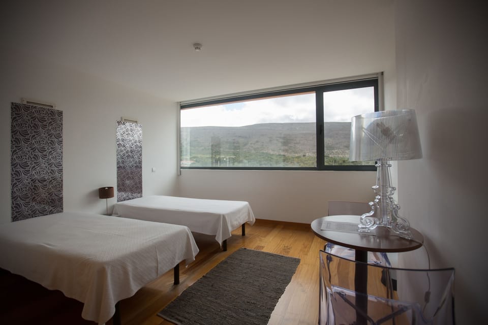 Twin Room, Private Bathroom | Blackout drapes, WiFi (free), bed sheets
