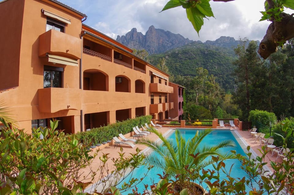 Seasonal outdoor pool, open 9:30 AM to 9:00 PM, sun loungers