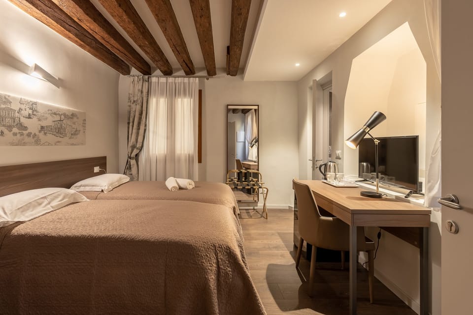 Classic Double Room, 1 Queen Bed, Non Smoking | Minibar, desk, laptop workspace, blackout drapes