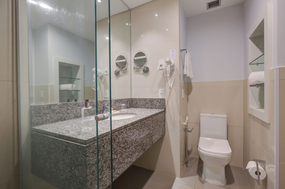 Shower, rainfall showerhead, eco-friendly toiletries, towels