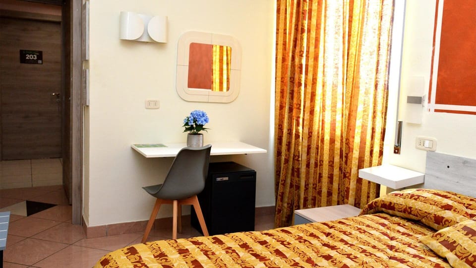 Desk, blackout drapes, soundproofing, free WiFi
