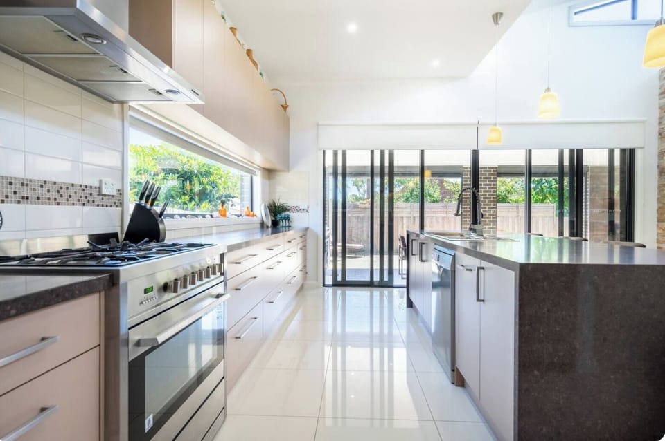 Kitchen with large oven & dishwasher
