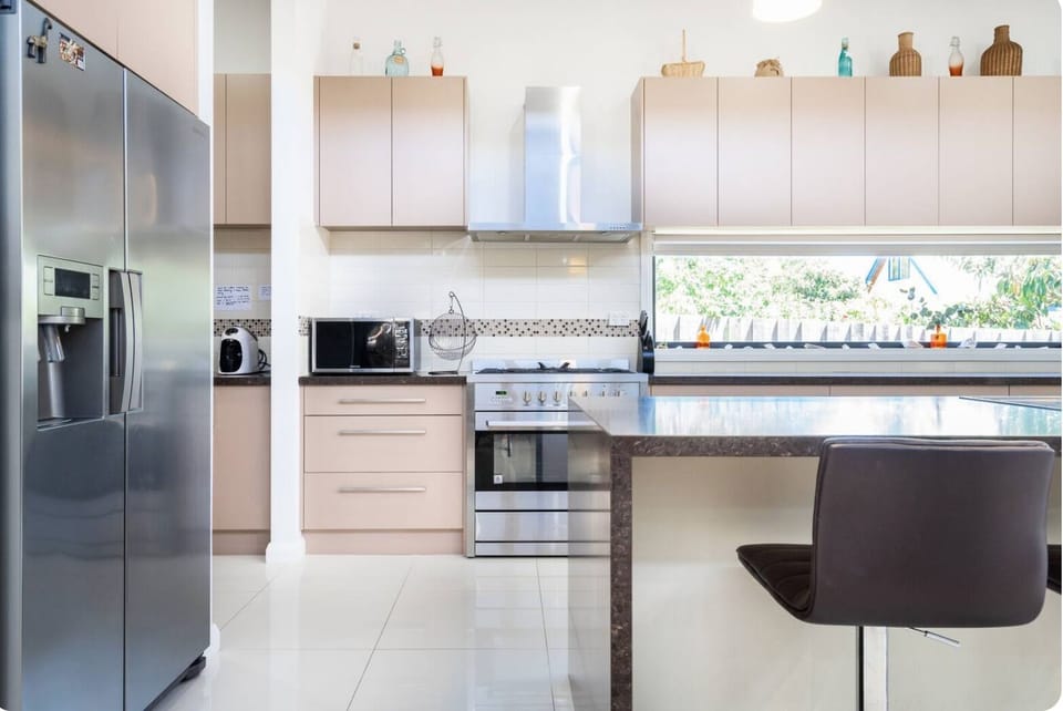 Kitchen large fridge with water & I've dispenser, Microwave & large oven
