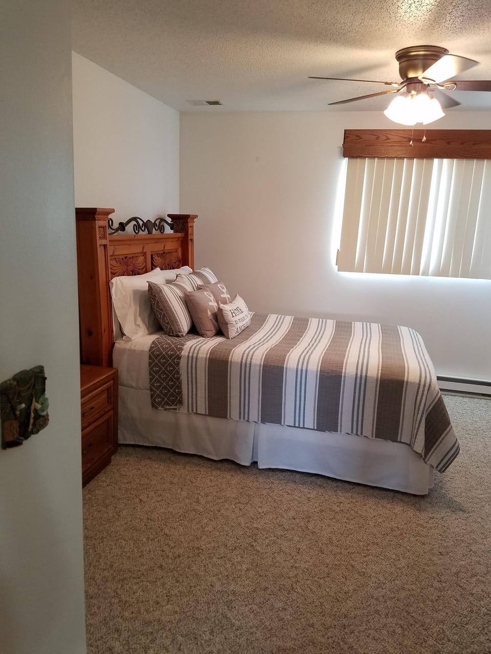 Queen Bed with stacked washer and dryer