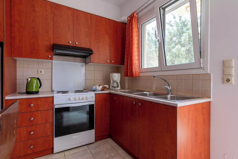 Fully equipped kitchen with coffee-tea maker and kettle, microwave