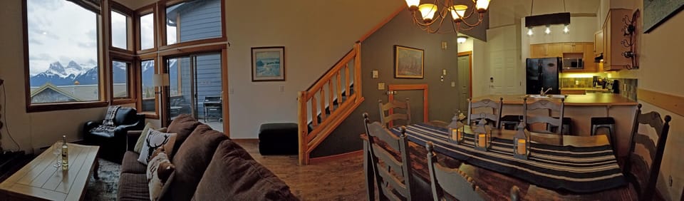 Overview photo of downstairs' great room with view to mountains