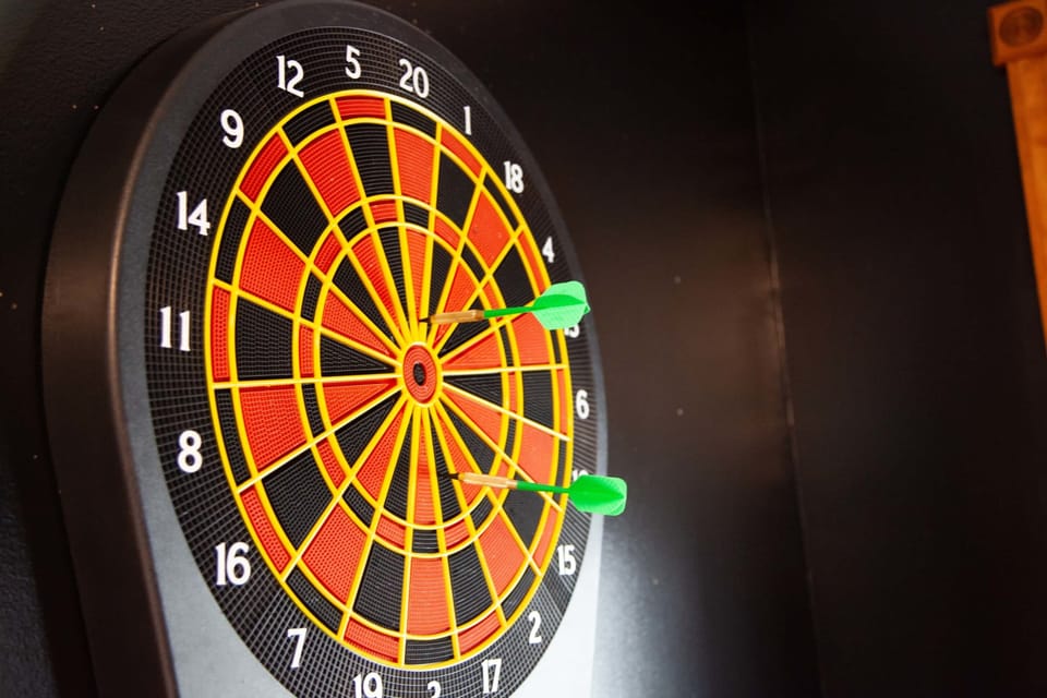 Movie room– Digital scoring dartboard for competitive fun.