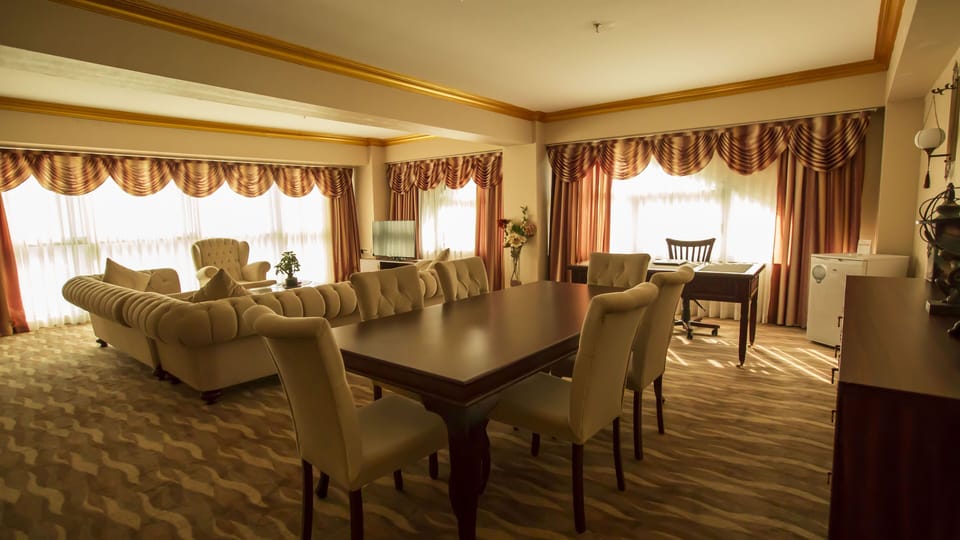 Grand Suite, 1 Bedroom, Valley View | Living area | 32-inch LCD TV with cable channels, TV, heated floors