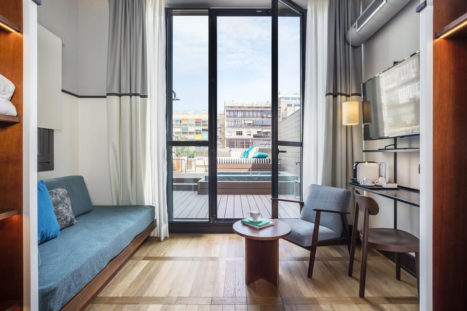 Premium Room, Terrace | Minibar, in-room safe, desk, blackout drapes