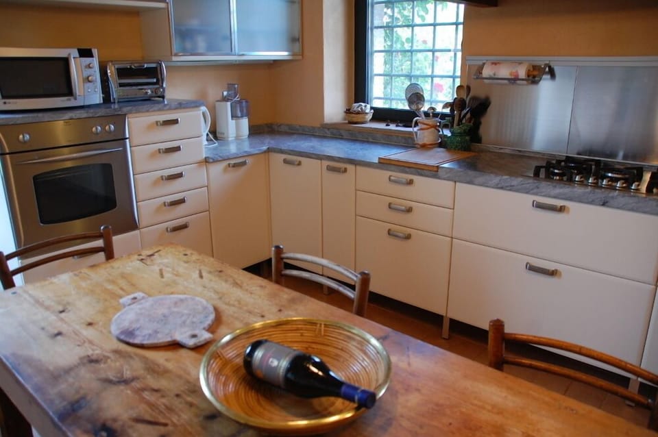 Villa, 4 Bedrooms | Private kitchen | Full-size fridge, microwave, oven, stovetop