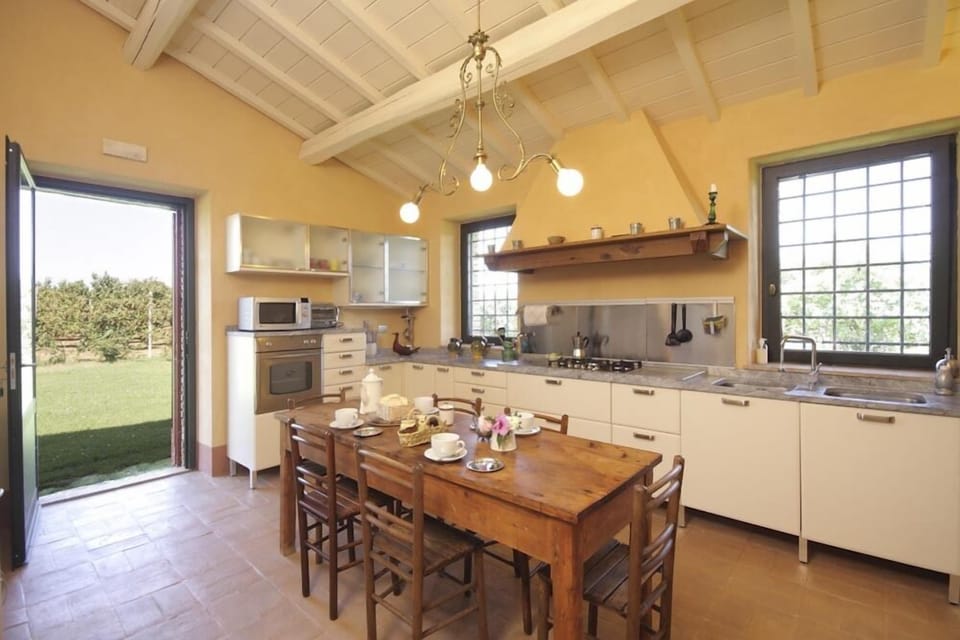 Villa, 4 Bedrooms | Private kitchen | Full-size fridge, microwave, oven, stovetop