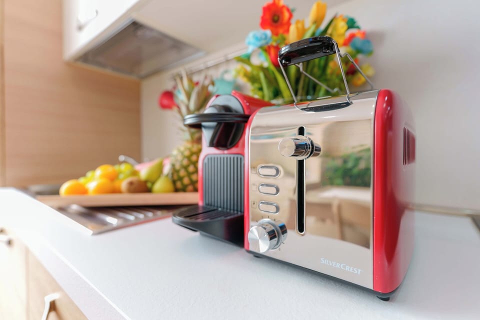 Shared fridge, microwave, espresso maker, coffee/tea maker