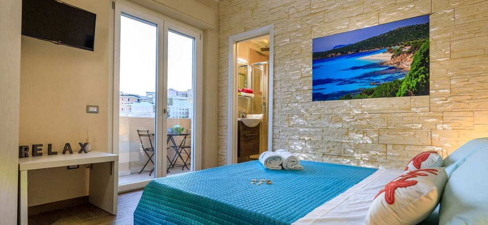 Suite 1, Cagliari Magica, vista panoramica | 2 bedrooms, Egyptian cotton sheets, premium bedding, down comforters