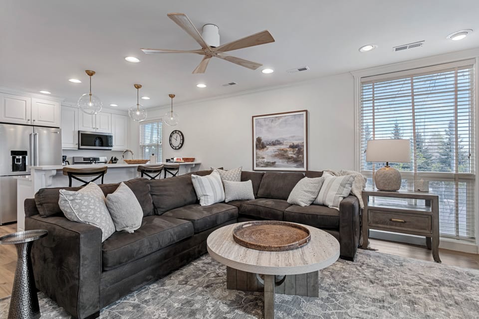 Open-concept living and kitchen at Three Kings 83 — bright, modern, and inviting