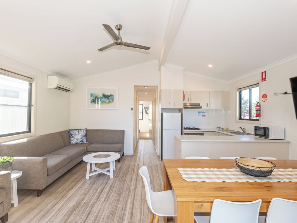 Deluxe Riverfront 3 Bedroom Villa - Not Pet Friendly | Living area | Flat-screen TV