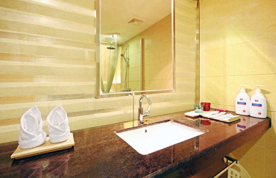 Shower, free toiletries, hair dryer, slippers