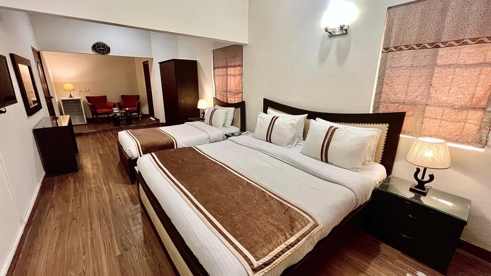 Family Triple Room, Accessible, Non Smoking | Desk, blackout drapes, soundproofing, free WiFi