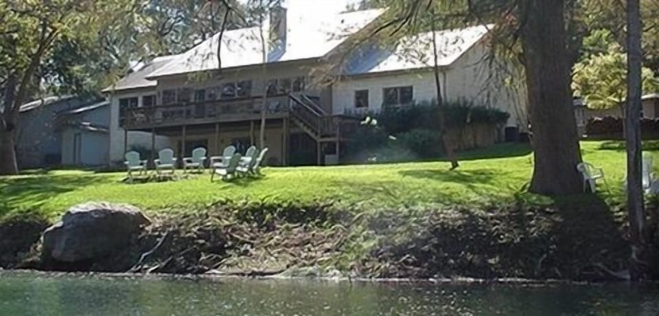 View of the River House, Fire-Ring, and Backyard Shore, from the Guadalupe River