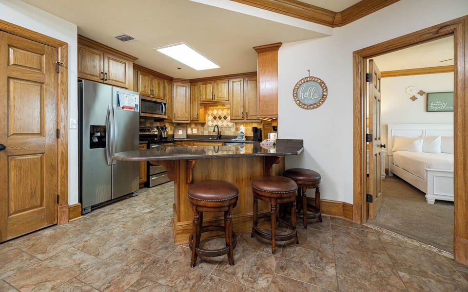 Gather around the stylish breakfast bar, perfect for enjoying meals or morning coffee