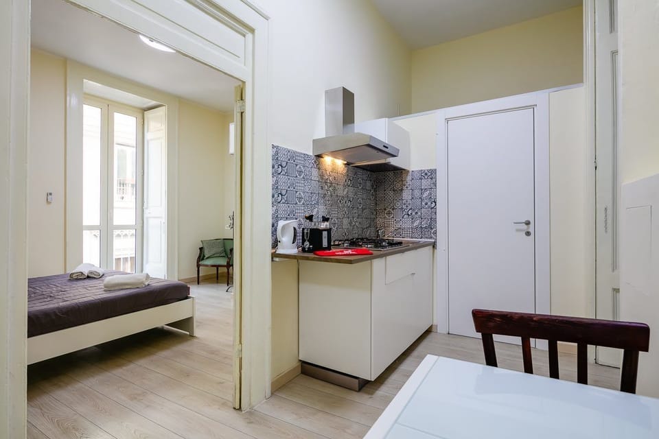 Apartment, 2 Bedrooms | Private kitchenette | Fridge, stovetop, coffee/tea maker, electric kettle