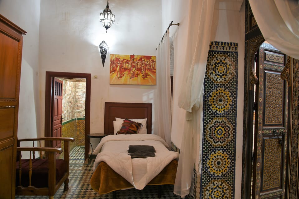 Family Quadruple Room | Desk, blackout drapes, iron/ironing board (on request), cribs (free)