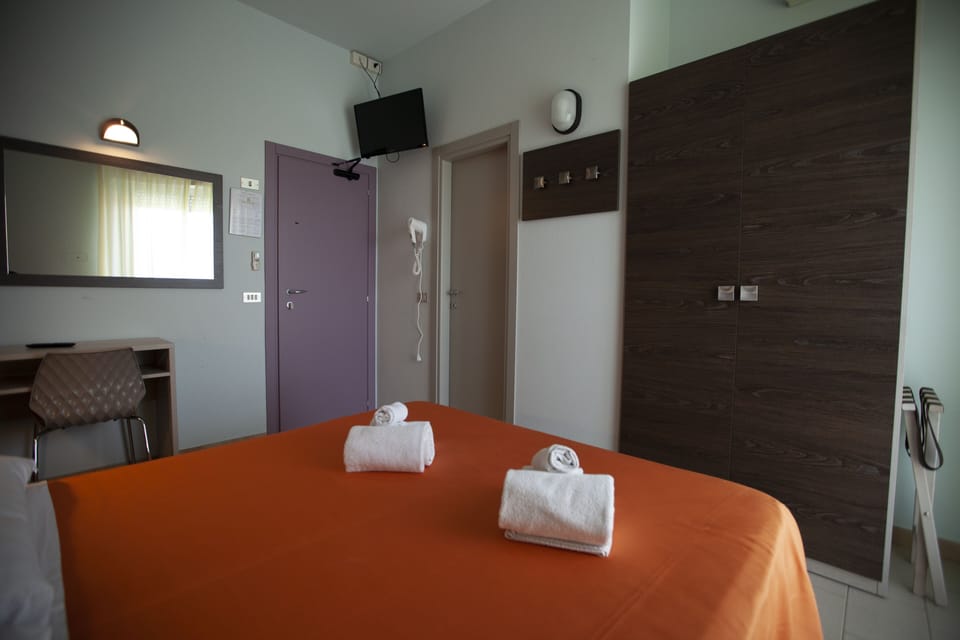 Economy Double or Twin Room, Balcony | Minibar, in-room safe, desk, cribs/infant beds