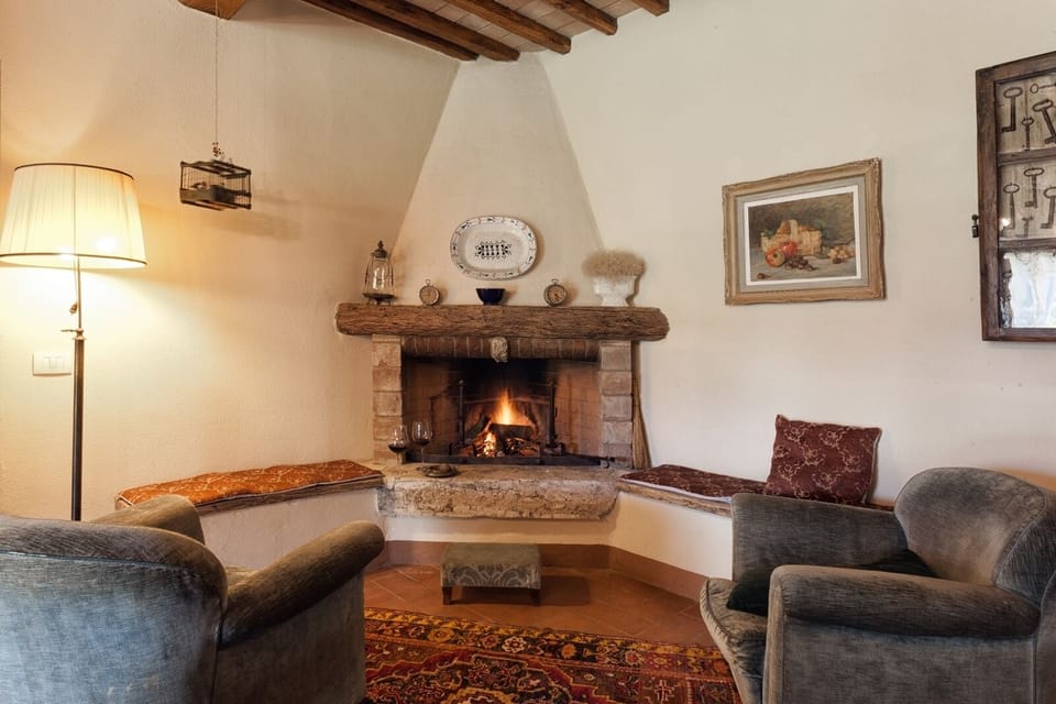 Family Apartment, 2 Bedrooms, Garden View, Ground Floor (Farfalle) | Living area | 32-inch TV with satellite channels, fireplace