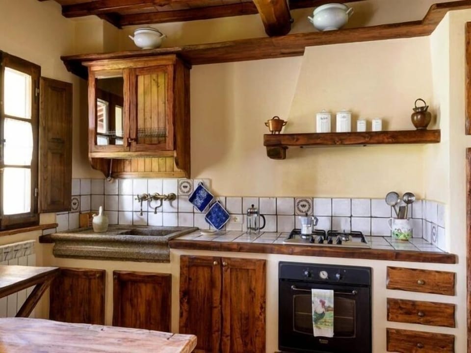 Family Apartment, 2 Bedrooms, Garden View, Ground Floor (Farfalle) | Private kitchen | Full-size fridge, oven, stovetop, dishwasher