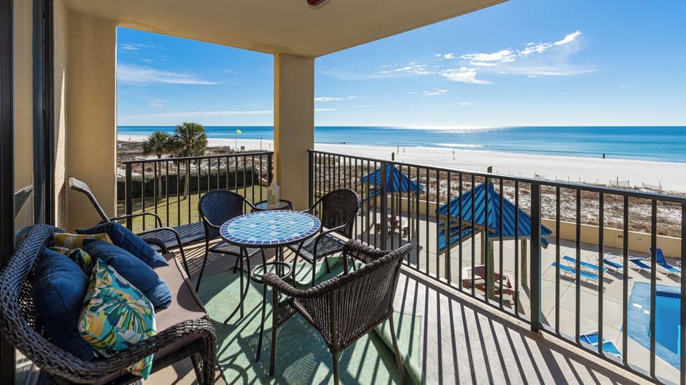 Your balcony invites morning coffee with gentle gulf breezes and soft sounds of waves near the shore