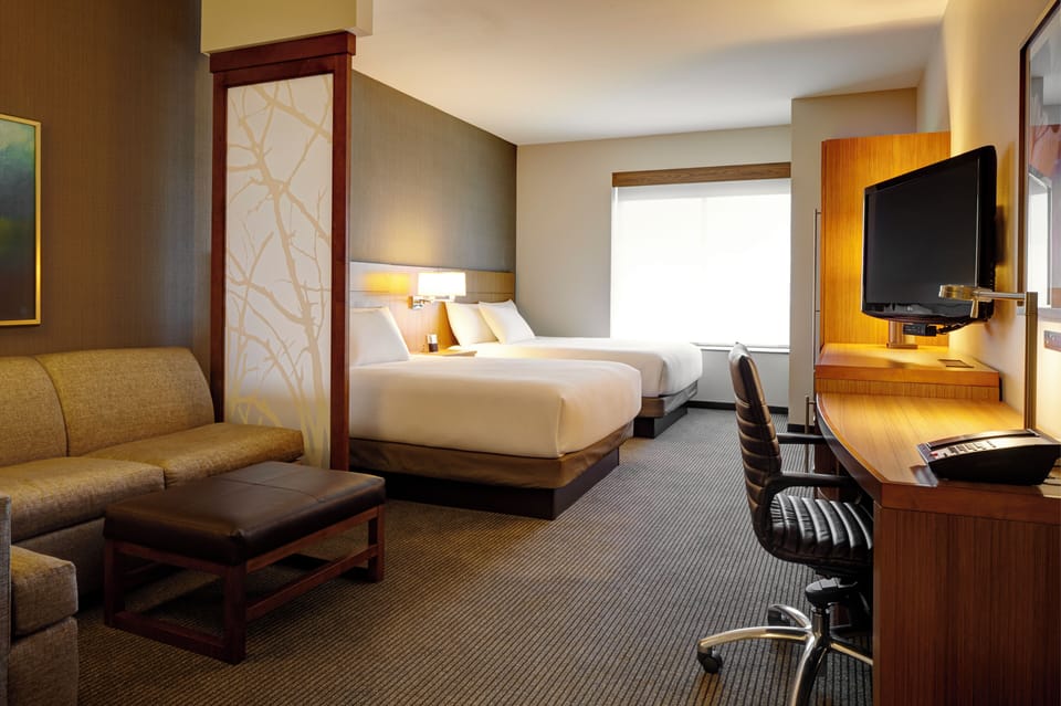 Premium bedding, down comforters, pillowtop beds, in-room safe